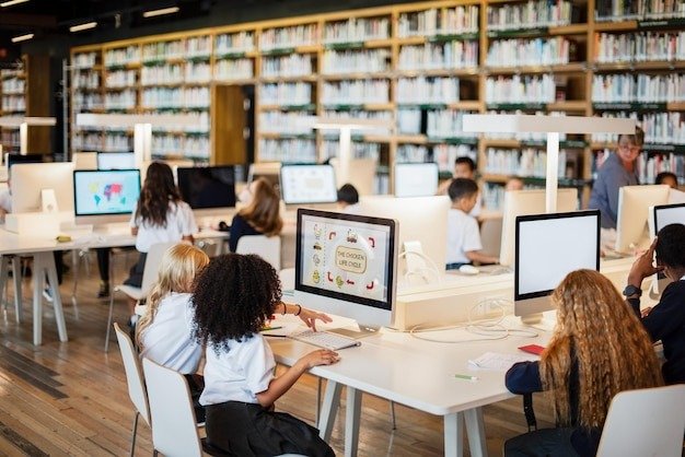Students working on computers in a school library